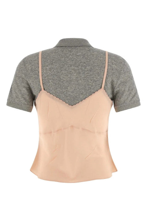 Two-tone top with gray and beige sections on a white background
