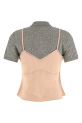 Two-tone top with gray and beige sections on a white background