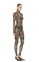 Camouflage bodysuit worn by a model on a white background