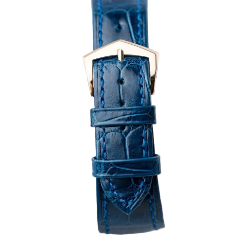 Blue crocodile leather watch strap on a white background