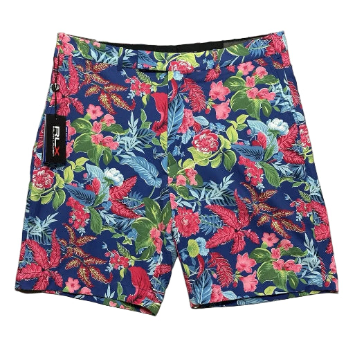 Colorful floral-patterned shorts with a brand label on a plain background