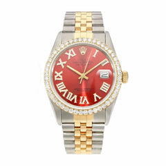 Luxury watch with red face, gold and silver band on white background