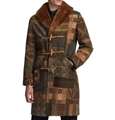 Patchwork coat with fur collar on a gray background