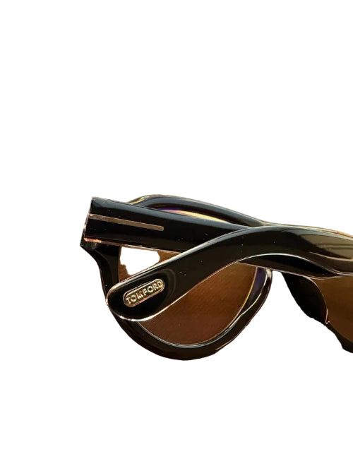 Glasses with a case on a reflective surface