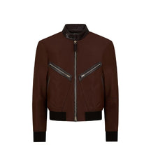 A dark brown faux-leather bomber jacket with black ribbed trim at the collar, cuffs, hem, and two diagonal zippered chest pockets, shown on a plain white background.