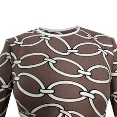 A close-up of a brown long-sleeve shirt featuring a white chain-link pattern across the front.