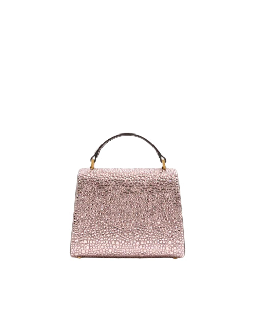 Pink textured handbag on a white background