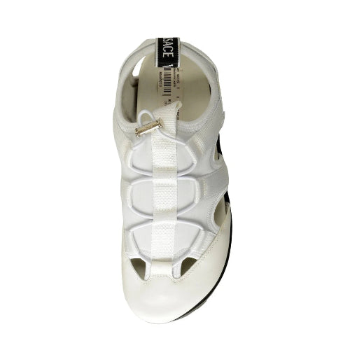 White sandal with a visible brand label on a white background