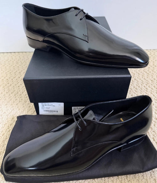 Black dress shoes on a white background