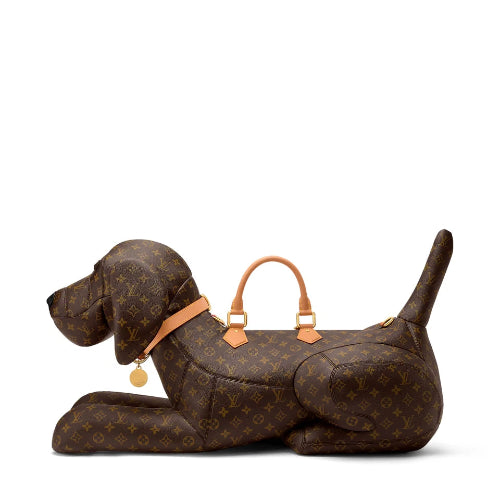A brown leather dog-shaped bag with a tan leather collar, photographed against a plain white background.